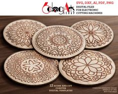 four wooden coasters with intricate designs on the front and back, sitting on a table