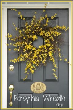 the front door is decorated with yellow flowers