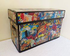 the chest is covered with comic books and comics