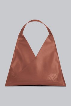 The oversized soft-touch Leather Tote Bag is a timeless essential for the modern wardrobe. Crafted from 100% cow leather, this luxurious tote seamlessly combines style and functionality. With its sleek design and embossed logo, it exudes understated sophistication while offering ample space for all your essentials. Whether you're heading to the office, beach, or out for the evening, this tote ensures you're always prepared in style. Key features include: 100% premium cow leather for a soft-touch Half Zip Sweatshirt, Modern Wardrobe, Navy Stripes, Embossed Logo, Leather Tote Bag, Cow Leather, Leather Tote, Sleek Design, Everyday Essentials Products