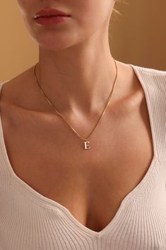 Introducing our exquisite Initial Necklace, a timeless piece of jewelry crafted with love and attention to detail. Each monogram necklace features a delicate gold letter pendant, adding a touch of sophistication to any ensemble. Embrace the beauty of personalized jewelry with our stunning Initial Necklace. Order now and make every moment unforgettable! 🌟 Personalized Perfection: Choose your initial for a unique dainty necklace or a thoughtful gift for someone special. 💖 Timeless Sophistication Dainty Letter Necklaces For Everyday, Dainty Letter Necklaces For Everyday Wear, Dainty Letter Necklace For Everyday Wear, Elegant Everyday Letter Necklace, Gold Clavicle Chain Name Necklace For Everyday, Gold Minimalist Letter Necklaces, Minimalist Gold Letter Necklaces, Elegant Yellow Gold Letter Necklaces, Elegant Gold Letter Shaped Jewelry