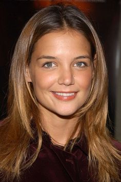 a close up of a person with long hair