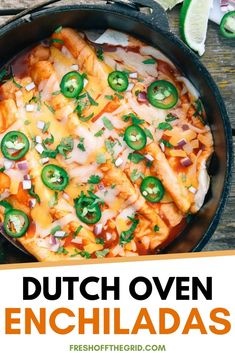 dutch oven enchiladas in a cast iron skillet topped with cheese and jalapenos