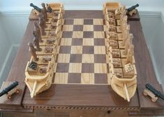 a wooden chess board with several pieces on it