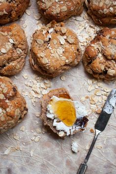 several cookies with an egg in the middle and some oatmeal on top