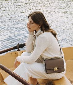 Discover the subtle elegance of our Hortensia Fleuron bag in calfskin, bathed in the rich, autumnal hue of Candied Chestnut. This masterpiece, crafted with meticulous attention in our Italian ateliers, is noted for its refined design and enduring appeal.
To create a look that effortlessly blends sophistication with softness, complement this exquisite piece with nature-inspired tones like caramel, golden beige, or taupe. Such a color scheme enhances its warm undertones, creating a cohesive visual harmony. Introduce vibrant contrasts with shades such as burgundy red or peacock blue to highlight the bag's deep, sophisticated color and its nuanced richness.
The clasp, intricately fashioned into a hydrangea flower, signifies our commitment to the art of luxury and craftsmanship. In Timeless Formal Bags For Fall, Luxury Smooth Grain Bags For Fall, Timeless Brown Shoulder Bag For Evening, Timeless Brown Bags For Fall, Timeless Brown Bag For Fall, Timeless Brown Bags For Everyday Luxury, Brown Timeless Bag For Everyday Luxury, Luxury Formal Bags For Fall, Luxury Formal Bag For Fall