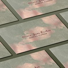 six business cards with pink flowers on them