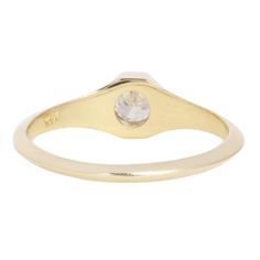 Confident and bold, this solitaire signet ring by WWAKE features a twinkling white antique old European cut diamond. High polish 14k gold frames the stone in a subtle octagonal shape. A flattened knife-edge band allows this stunning signet to stack with other rings. Stones: .25ct White Antique Old European Cut Diamond (Color G/H, VS2) Metal: 14k Yellow GoldMeasurements: Stone length: 4mm, Setting width: 5mm, Setting height: 3.4mm, Band width: 2.9-1.5mm taper Shipping and Delivery: IN STOCK items 14k Gold Signet Ring With Bezel Setting, Timeless Octagon Rose Cut Diamond Ring, Octagon Signet Ring With Polished Finish For Anniversary, Classic Diamond Signet Ring With Bezel Setting, Classic Oval Signet Ring With Rose Cut Diamonds, Timeless Bezel-set Signet Ring, Timeless Oval Signet Ring With Single Cut Diamonds, Diamond Signet Ring In Yellow Gold With Bezel Setting, Timeless Birthstone Ring With Bezel Setting