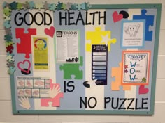 a bulletin board with pieces of puzzle on it that says good health is no puzzle