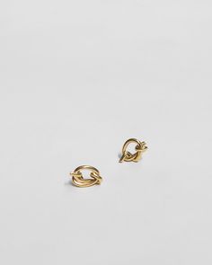 Perfectly asymmetrical stud earrings, individually hand sculpted in wax wire, then cast in recycled 14k gold. Earrings measure approximately 3/8" in diameter. Solid 14k gold posts and backs. Availability: Currently in stock and ready ship. Knot Earrings, Gold Earrings, Knot, 14k Gold, Wax, Stud Earrings, Gold