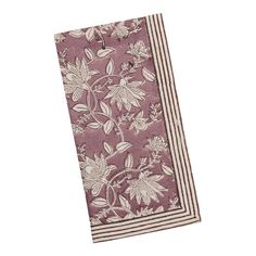 a purple and white towel with flowers on it