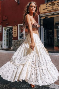 Always feel your best in the Eleanor White Boho Skirt! A dainty lace pattern on a midi A-line silhouette, a high elastic waist, and a flowy fit make this Boho Chic as comfortable as it is spectacular! The empire waistline is flattering on all body types, while the mid-calf length makes it a versatile piece that can be dressed up or down.  Check the size guide for a perfect fit!   Fabric: Cotton  Silhouette: A-line  Pattern: Floral  Length: Mid-calf  Waistline: Empire  Style: Bohemian  Decoration White Boho Skirt, Harry Clarke, Flowy Skirts, Character Clothes, Tulle Long Skirt, Beachy Outfits, Hippie Aesthetic, Boho Styl, Random Fashion