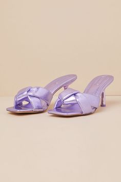 It's girls night out and the D'Amelio Footwear Leenoa Lavender Metallic Knotted High Heel Slide Sandals are ready to strut! These eye-catching heels have a metallic, textured faux leather construction that shapes a square footbed and lightly padded, knotted vamp. The easy slide-on design sits atop a shiny stiletto heel. 3" stiletto heel. Cushioned insole. Felted rubber sole has nonskid markings. Man made materials. Imported. Lulus | Leenoa Lavender Metallic Knotted High Heel Slide Sandal Heels | Metal Clothing, Sandal Heels, Spring Shoes, Party Shoes, Girls Night Out, Stiletto Heel, Low Heels, Slide Sandals, Girls Night