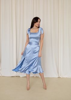 Comfortable midi bridesmaid dress with ruffle and ties. Add this beautifull sky light blue color to mismatched bridesmaid dress palette. Let this dress be you "something blue" - Luxe silk/satin fabric - Linning on top bust area (comfortable wear without bra) - Adjustable ties on straps - Adjustable belt - Slit on right leg - Ribbons on back for better slim fit - Model wear M size, she is 5'6 \ 172 cm (88 - 64 - 98 cm) SIZES XS size: Bust = 33 inch / 84 cm Waist = 24.5 inch / 63 cm Hips = 36.5 / Light Blue Silk Dress, Light Blue Satin Dress, Wedding Guest Dress Cocktail, Satin Bridesmaids, Midi Dress Wedding, Midi Dress Wedding Guest, Blue Satin Dress, Midi Bridesmaid Dress, Wedding Green