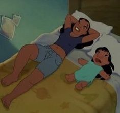 an animated image of two people laying on a bed