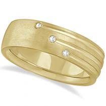 a yellow gold wedding ring with three diamonds