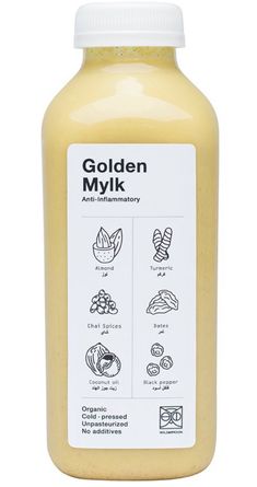 a bottle of golden milk with the label on it's side and instructions for how to use it