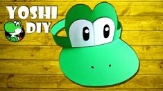 yoshi diy cut out with paper on wooden background