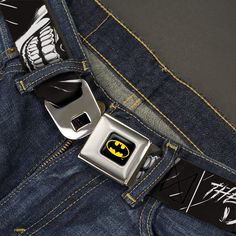 the batman belt is attached to an old pair of jeans with a batman logo on it