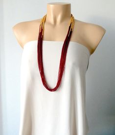 "Boho necklace for women, burgundy necklace. More items in garnet: https://www.etsy.com/shop/StephanieMartinCo?ref=seller-platform-mcnav&search_query=garnet It has 8 strands and measures 33\" ❤ PROCESSING AND SHIPPING Most orders are made and shipped out in one business day. Please check delivery timeframes for your location on the description below.  ❤ CUSTOM ORDERS If you like this item in a different color, send me a message indicating: color, size and quantity needed. I will send you a link for a \"custom order\" and you'll be able to place the order there.  If you like this item with some variations such as thickness or style, please also send me a message and I will work with you! Go back to my shop: https://www.etsy.com/shop/StephanieMartinCo See more fabulous necklaces here: https: Handmade Burgundy Necklace As Gift, Handmade Burgundy Necklace For Gift, Elegant Handmade Red Long Necklace, Handmade Burgundy Beaded Necklaces For Gifts, Handmade Burgundy Beaded Necklaces As Gift, Handmade Elegant Burgundy Necklaces, Elegant Handmade Burgundy Necklaces, Elegant Handmade Burgundy Necklace, Gold Beaded Necklace