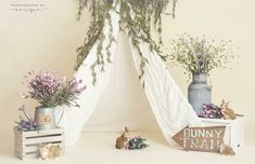 an image of bunny trail with bunnies and flowers