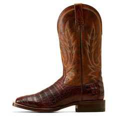 An exotic take on a true classic, this striking boot combines rich caiman belly with extremely intricate detailing along the shaft. Inside, you get TekStep, an extra layer of heel-to-toe cushioning, making it the most comfortable leather-sole boot you've ever worn. Gunslinger Cowboy Boot | Product Features : 0 : ATS® technology provides ergonomic support on uneven terrain, 1 : TekStep provides toe-to-heel cushion for comfort, 2 : Removable Pro Performance insole for cushioning and shock absorpti The Gunslinger, Ariat Boots, Mens Outfit Inspiration, Leather Cowboy Boots, Cowboy Boot, Wide Calf, Goodyear Welt, All Colors, Full Grain Leather