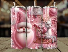 the santa claus and reindeer are on this pink christmas themed double wall art display case