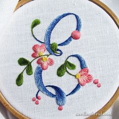 a close up of a embroidery on a hoop