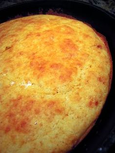 a close up of a baked food item in a pan