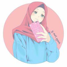 a woman wearing a hijab holding a cell phone