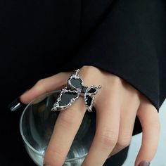 ✦ Unleash your dark and enchanting side with our Gothic Black Butterfly Open Ring. This captivating ring features a beautifully detailed butterfly design in a gothic black finish. Embracing the essence of both beauty and darkness, this ring is a unique blend of elegance and edge. The open design adds a contemporary twist, allowing for an adjustable and comfortable fit. Whether you're a fan of gothic aesthetics or simply adore the mystique of butterflies, this ring is the perfect accessory to exp Detailed Butterfly, Elegant Gothic, Basic Jewelry, Nose Rings Hoop, Crystal Hoop Earrings, Butterfly Ring, Black Cocktail, Black Butterfly, Butterfly Jewelry