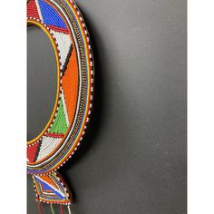 Vintage African Masai Beaded Traditional Wedding Necklace Artifact Wall Decor from Kenya. One of a kind piece artifact , expertly hand beaded by the skillful Maasai people. This Bold and colorful necklace is worn among the Masai people of Kenya during weddings and special festivals. Colorful beadwork, each color bead represents a different aspect of the Maasai culture: Bravery, (red), Energy (blue), Purity (white), Nourishment (green), Warmth & Generosity (orange), Cycle of Life (yellow ), and B Traditional Handmade Beaded Necklaces For Ceremonies, Traditional Handwoven Beads For Jewelry Making, Traditional Handwoven Beaded Necklaces For Festivals, Multicolor Traditional Pattern Necklace As Gift, Traditional Handwoven Beads For Festivals, Multicolor Beaded Necklaces For Traditional Ceremonies, Artisan Beaded Necklaces For Traditional Ceremonies, Artisan Multicolor Necklaces For Traditional Ceremonies, Multicolor Artisan Necklace For Traditional Ceremonies