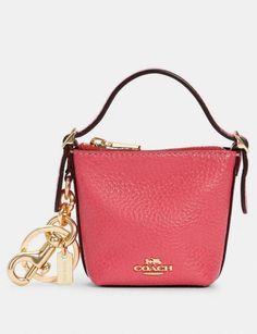 COACH C 3125 Mini Val Duffle Bag Charm Refined pebble leather Zip closure, fabric lining Handle with 1 3/4" drop Attached split key ring and dogleash clip 3" (L) x 3" (H) x 1 1/4" (W) Coach Leather Bags As A Gift, Small Everyday Bags With Interior Key Chain Holder, Coach Satchel Shoulder Bag Gift, Coach Top Handle Shoulder Bag As Gift, Leather Bag Charm With Interior Key Chain For Travel, Coach Bags With Removable Pouch As Gift, Coach Rectangular Bucket Bag For Shopping, Coach Rectangular Bucket Bag For On-the-go, Rectangular Coach Bucket Bag For On-the-go