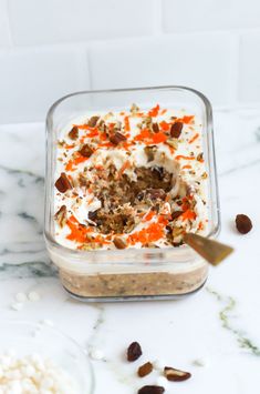 carrot cake overnight oats in a glass dish on a marble counter with text overlay