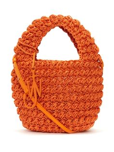 tangerine orange wax coated interlock weave logo charm open top cut-out top handle adjustable detachable shoulder strap main compartment internal logo patch unlined Orange Top Handle Shoulder Bag For Summer, Orange Bucket Bag For Travel, Trendy Orange Shoulder Bag With Leather Handles, Summer Orange Bags With Detachable Handle, Orange Shoulder Bag With Braided Handles For Shopping, Orange Tote Bucket Bag For Shopping, Spring Orange Bags With Braided Handles, Trendy Orange Bags With Braided Handles, Orange Bags With Braided Handles For Shopping