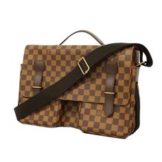 Never Used! Stored For A Long Time. This Is An Authentic Louis Vuitton Damier Ebene Broadway Messenger Bag. This Chic Messenger Bag Is Crafted Of Louis Vuitton's Signature Damier Checkered Canvas In Brown. The Shoulder Bag Features A Nylon Cross-Body Strap With Gold Adjustment Buckles And Links And A Brown Leather Top Handle. The Cross Over Flap Covers Two Bucket Pockets With Facing Chocolate Leather Belts And Links To Thread Them Through. The Flap Opens To A Burnt Orange Fabric Interior With Pa Business Satchel In Signature Coated Canvas, Luxury Coated Canvas Satchel With Flap, Business Rectangular Satchel In Signature Coated Canvas, Business Bags With Detachable Strap In Coated Canvas, Business Bags With Detachable Strap And Signature Coated Canvas, Business Signature Coated Canvas Satchel, Modern Brown Monogram Canvas Satchel, Monogram Canvas Flap Satchel For Travel, Business Satchel With Adjustable Strap In Monogram Canvas