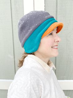 "OMG!!!! Never knew a hat that would fit perfect, is very comfortable, soft, and keeps my ear warm too...all in one, wow!" - Gail, TX Women's Fleece Beanie Hat A NEW Trio of Colors Hat! This anti-pill fleece newsboy hat is designed with function, style and you in mind. Need more color in your life? Yes! Triple your fun in the new fleece hat color combo in a pre-selected trio of yummy fleece colors! Whether you're shoveling the driveway or tackling the big grocery day on a blustery winter day - d Windproof Beanie Hat One Size, Fleece Lined Beanie Hat, One Size Fits Most, Beanie With Fleece Lining, One Size Fits Most, Fleece-lined Beanie Hat, One Size Fits Most, Fleece-lined Beanie Hat, One Size, Adjustable Hats With Fleece Lining For Winter Sports, Adjustable Winter Sports Hats With Fleece Lining, One Size Beanie With Fleece Lining, Adjustable Fleece-lined Hats For Winter Sports