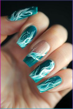 Make waves with these ocean-inspired teal designs featuring sculpted wave accents. #nailart #naildesign #tealnails #wavynails #waterydesigns #greendressnails Blue And Teal Nail Designs, Ocean Green Nails, Teal Nails Design Ideas, Green Ocean Nails, Ocean Waves Nail Art, Teal Beach Nails, Nail Art Waves, Nail Designs Ocean, Ocean Nails Designs