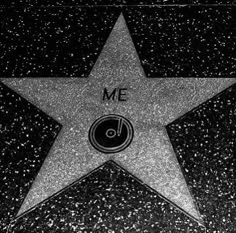 the star on the hollywood walk of fame is shown in this black and white photo