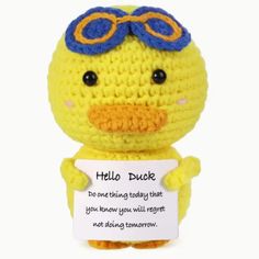 a yellow stuffed duck holding a sign that says hello ducke do one thing today that you know you will forget not having tomorrow