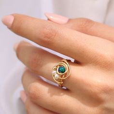 There is nothing ordinary about this handmade wrap ring. Set with a beautiful Atlantic Opal that goes well with any outfit. ☆ WHY THIS PIECE OF J E W E L R Y IS AWESOME! ☆ * Hand finished and made from high quality raw materials * Long lasting beauty & Timeless design * Set with a Atlantic Opal 5 mm, Fresh water pearls and a gold plated bead ♡ WRAPPING ♡ * All 23 Summers jewels arrive in a cute pouch or gift box so they are gift ready. DELIVERY ✉ * Most items are ready made but some are made to Bead Wrapping, Ring Pearl, Bijoux Fil Aluminium, Ring Wire, Ring Opal, Wire Wrapped Ring