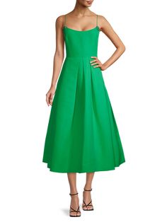 This charming scoopneck fit-and-flare gown is fashioned with pleat details at the waist, featuring playful side seam pockets in the full skirt. Scoopneck Sleeveless Back zip closure Side seam pockets 100% polyester Dry clean Imported SIZE  FIT Fit-and-flare silhouette About 50 from shoulder to hem Model measurements: 5'11 tall, 33 bust, 25 waist, 36 hips Model is wearing a US size 4 This brand fits slightly larger. Consider ordering a size down. ABOUT THE BRAND Flare Gown, Womens Wellness, Tall Model, Full Skirt, Designer Outfits Woman, Model Measurements, Trending Accessories, Square Neck, Saks Fifth