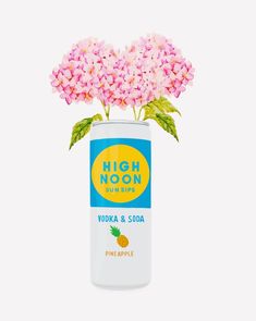 a can with pink flowers in it on a white background