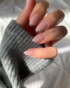 From subtle short nail styles to dazzling shimmers, these winter French tip nails, promise equal parts luxury and seasonal for your January manicure, particularly if you want your January nails to be a stark contrast to your December manicure , or if you're looking for very last minute NYE party nail art.