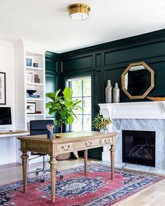 a living room filled with furniture and a fire place