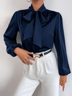 Navy Elegant Tops For Formal Occasions, Navy Elegant Formal Tops, Chic Navy Tops For Party, Chic Navy Party Top, Chic Navy Top For Party, Navy Chic Blouse For Spring, Chic Navy Blouse For Spring, Elegant Blue Blouse For Fall, Elegant Navy Tops For Spring