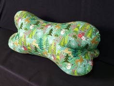 "This adorable 3-sided designer zippered dog bone bolster neck pillow is such a fashionable, fun way to ease the weariness in your neck and shoulders! It is made of 100% designer cotton fabric, from the Berry Merry collection by Basic Grey, and stuffed with hypoallergenic polyester fiberfill.  Your neck rests comfortably in the hollow of the dog bone, while the tips of the bone cradle your head. Great for traveling, watching TV, reading, resting after exercise, napping, etc. Great holiday gift, Post Surgery Gift, Unique Christmas Stockings, Whale Decor, Surgery Gift, Shoe Bags For Travel, Neck Bones, Zipper Neck, Large Christmas Stockings, After Exercise