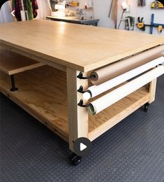 a workbench with two rolling wheels on it