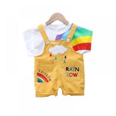 1-4Y Toddler Unisex Summer Sets Rainbow Print T-shirt Short Sleeves And Jumpsuits Two-piece Set Wholesale Summer Playtime Crew Neck Sets, Playful Rainbow T-shirt For Summer, Summer Playtime Sets With Crew Neck, Sleeveless Cotton Set With Cartoon Print, Sleeveless Cotton Cartoon Print Sets, Multicolor Cotton Sets With Crew Neck, Multicolor Cotton Crew Neck Sets, Summer Sets, Rainbow Bow