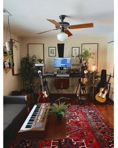 a living room filled with furniture and musical instruments